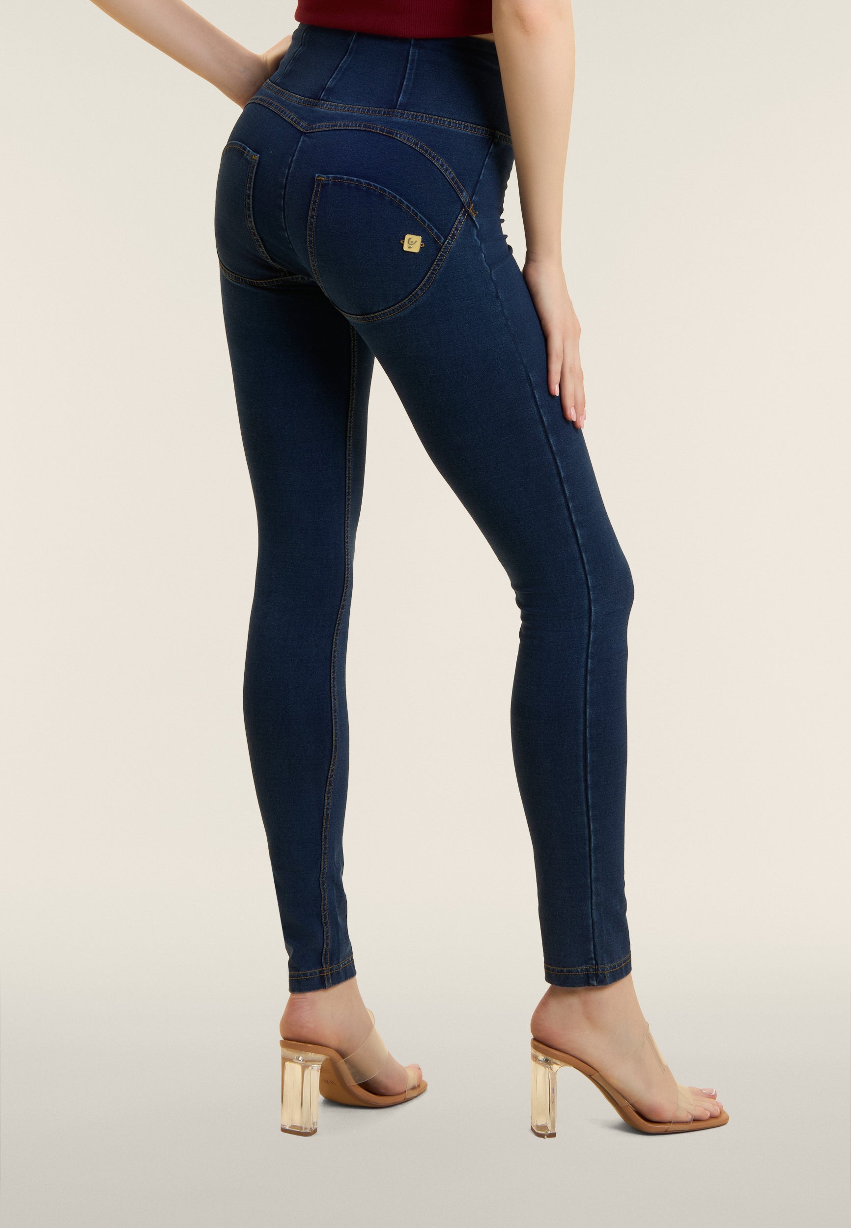 WR.UP® kalhoty s vysokým pasem a úzkým střihem (skinny) z pružného denimu v tmavě modré barvě, modrý šev